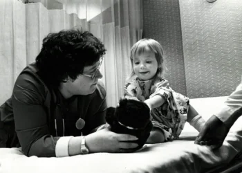 Nurse with young child-crop