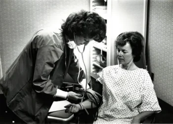 Patricia St. Bonore, RN with patient-crop